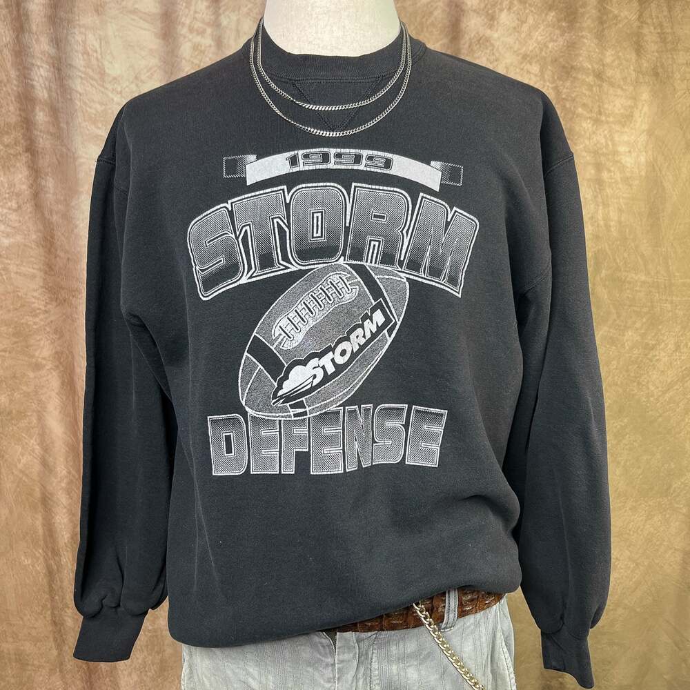 Vintage 90s Storm Defense Football Crewneck Sweatshirt Russell Athletic Sporty
